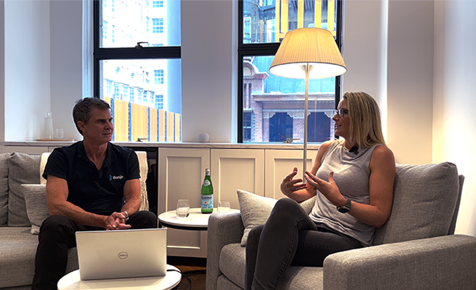 Banjo CEO Guy Callaghan and Strategic Psychotherapist Bronwyn Penhaligon sit in a living room in conversation.