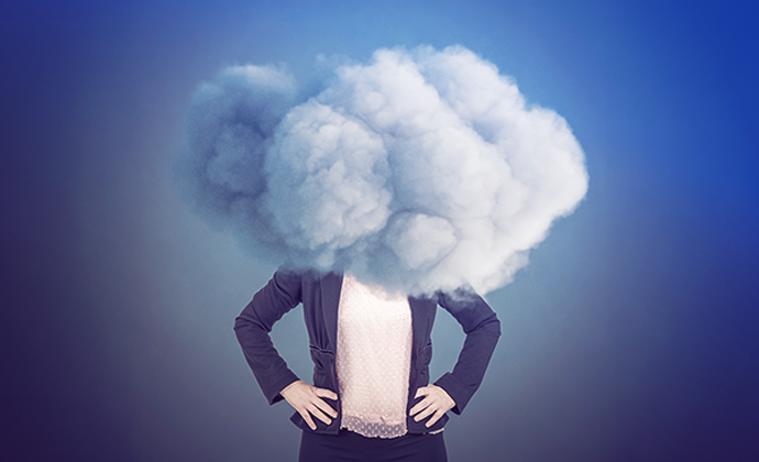 Finance broker stands with their hands on their hips and a grey cloud over their head.